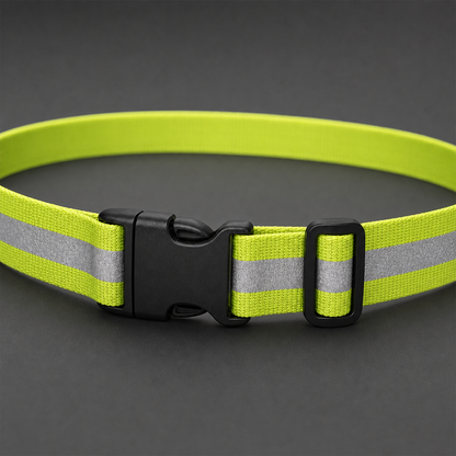 Close-up of the reflective belt buckle and adjustment slider