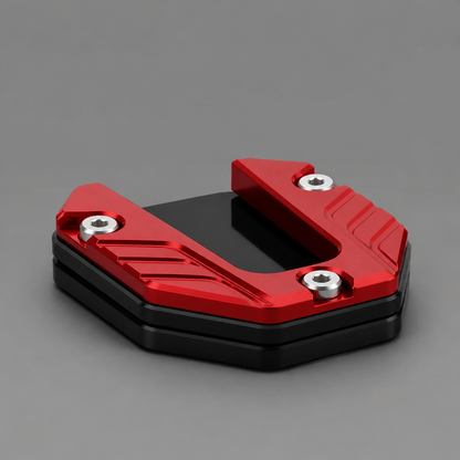 Red CNC motorcycle kickstand pad close side view
