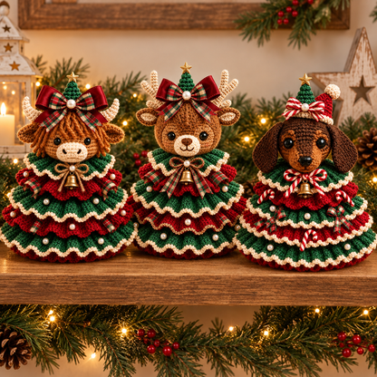 Three finished crochet animal trees on a Christmas shelf
