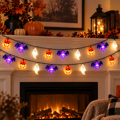 Battery powered Halloween string lights across an indoor mantel
