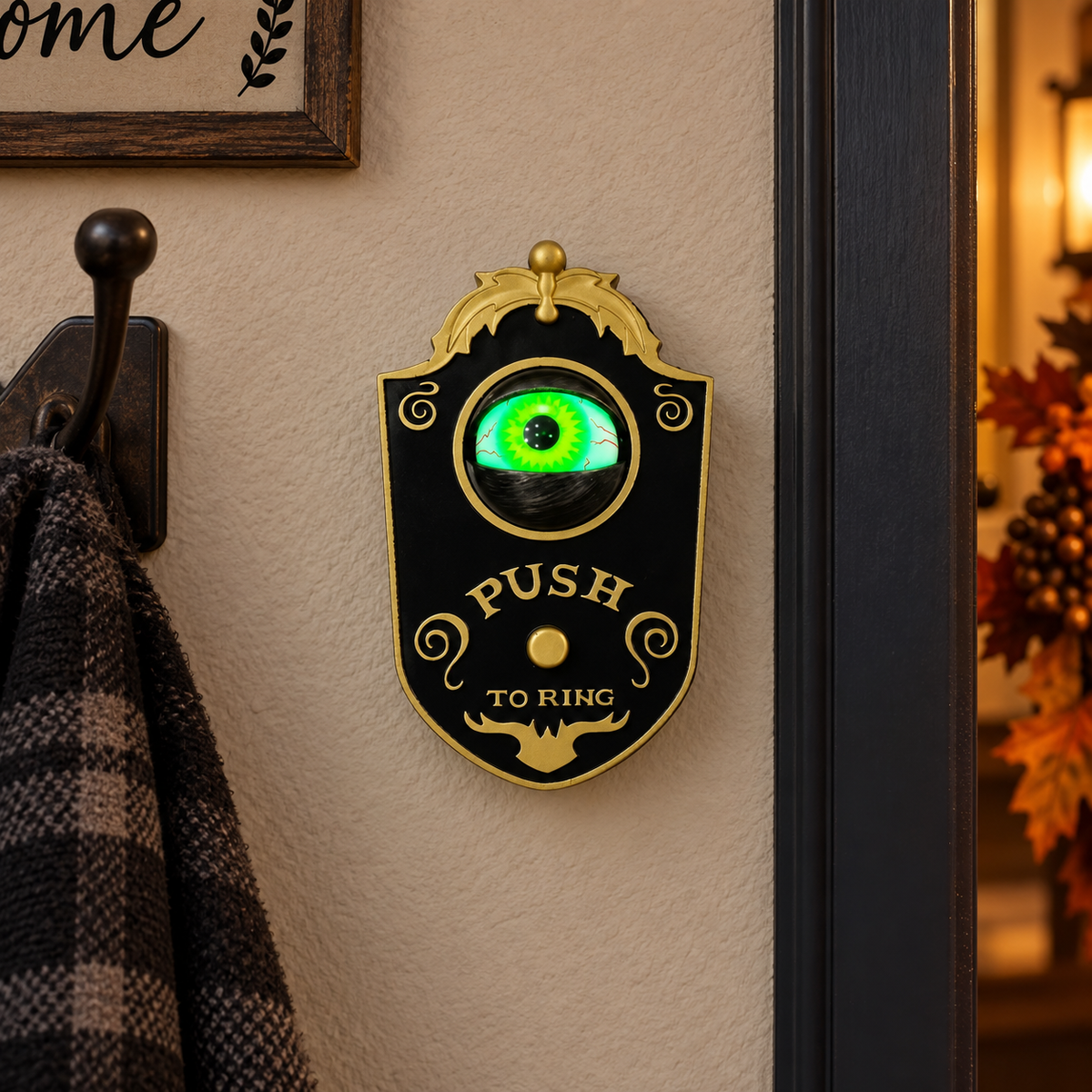 Black eyeball Halloween doorbell on an entry wall