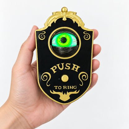 Hand held size view of the compact Halloween eyeball doorbell